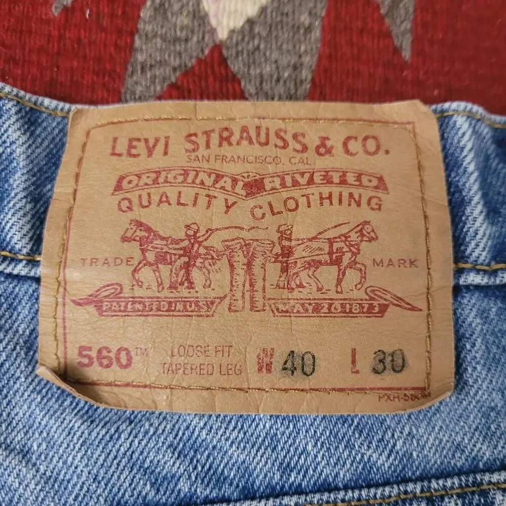Vintage 90s Levi's 560 Loose Fit Tapered‎ Leg Denim Jeans Sz 38x28.5 Light Wash